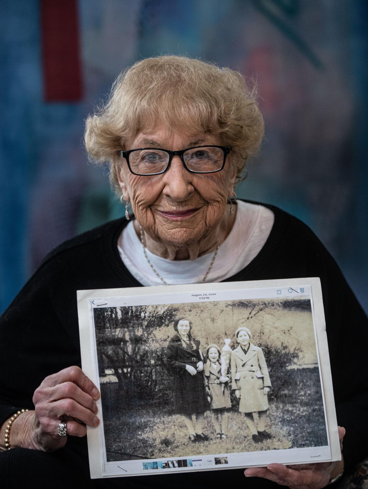 Hanne Holsten witnessed Kirstallnacht as a child in Gernany. Known as the ÒNight of Broken Glass" and taking place on Nov. 9 and 10, 1938, Kirstallnacht saw widespread pograms that destroyed Jewish businesses and led to the mass arrest and deportation of Jews to concentration camps. Holsten, now 93, and a resident of Hartsdale, sees parallels to what she witnessed as a child and the anti-semitism she sees today. She was photographed Nov. 9. 2023 with a photograph of her as a child with her two older siblings.