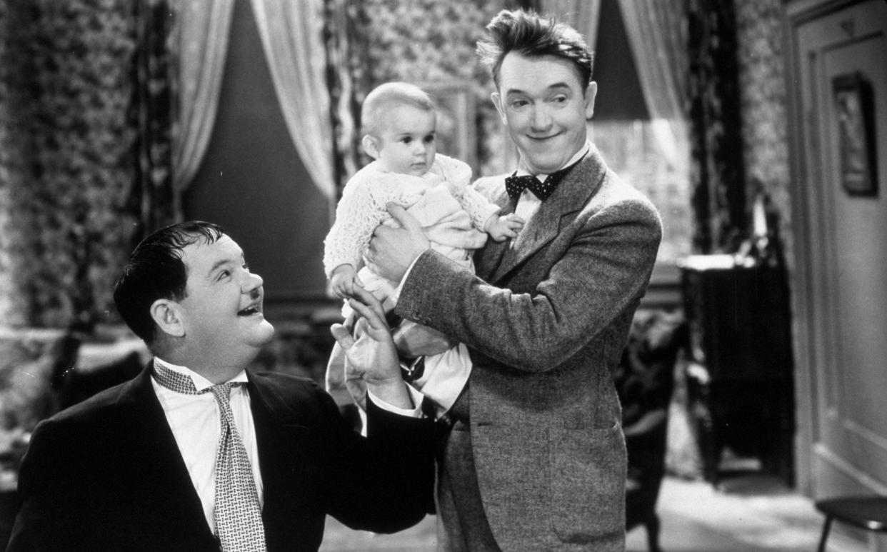 Marjorie Campbell with Oliver Hardy and Stan Laurel in Their First Mistake - Entertainment Pictures/Alamy