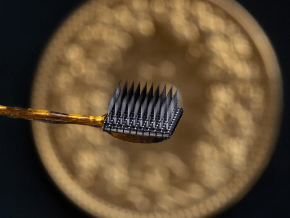 Two microelectrode arrays, each 3.2mm square, were inserted into the surface of the motor cortex in the frontal lobe of the brain (Wyss Center for Bio Neuroengineering)