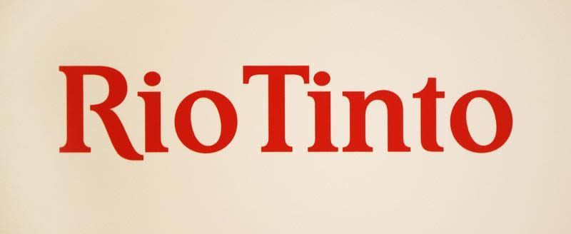 A Rio Tinto logo is displayed on the front of a wall panel during a news conference in Sydney November 29, 2012. REUTERS/Tim Wimborne