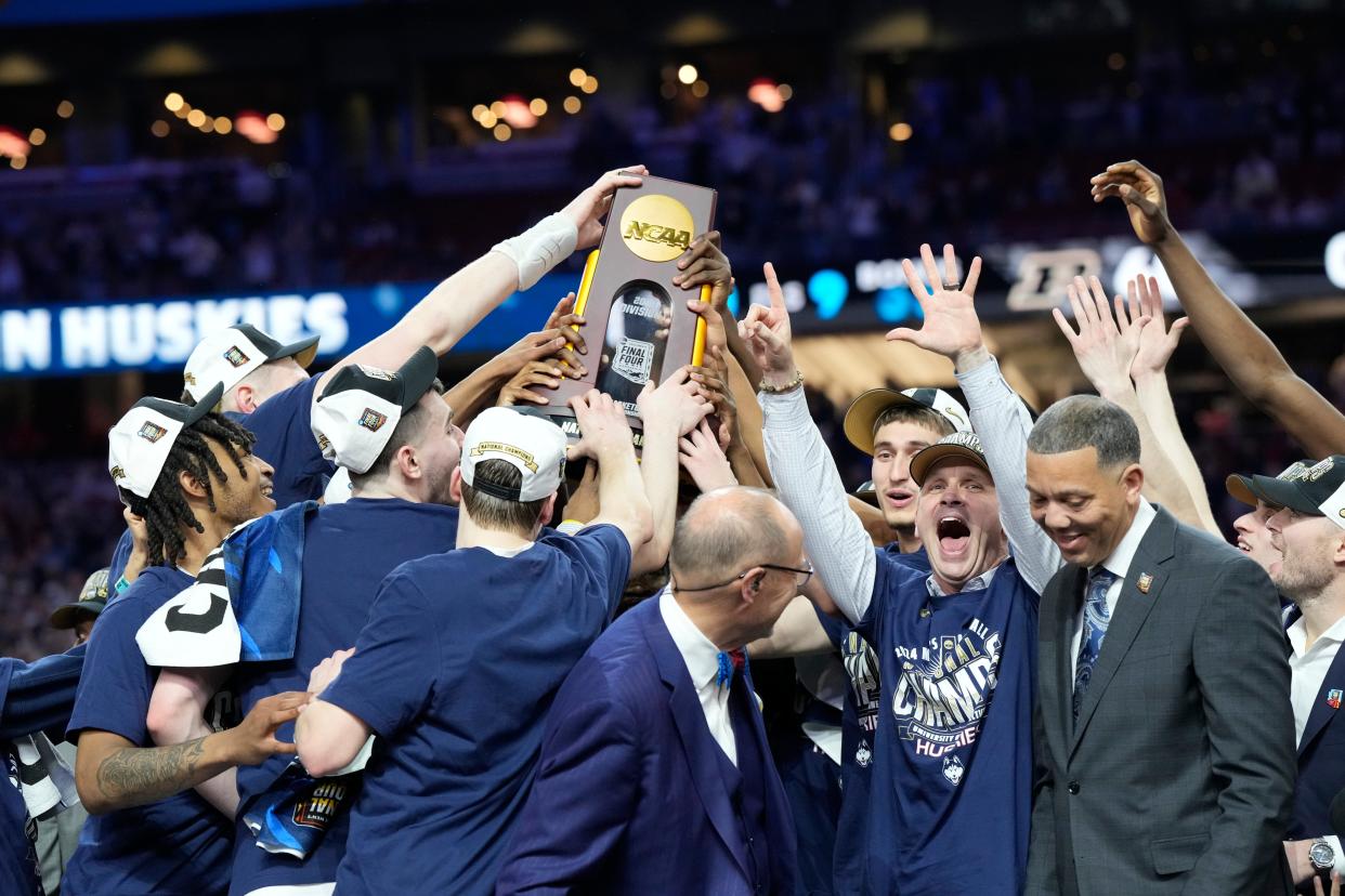 Connecticut Huskies celebrate winning the Men's NCAA national championship game against the Purdue Boilermakers at State Farm Stadium in Glendale on April 8, 2024.