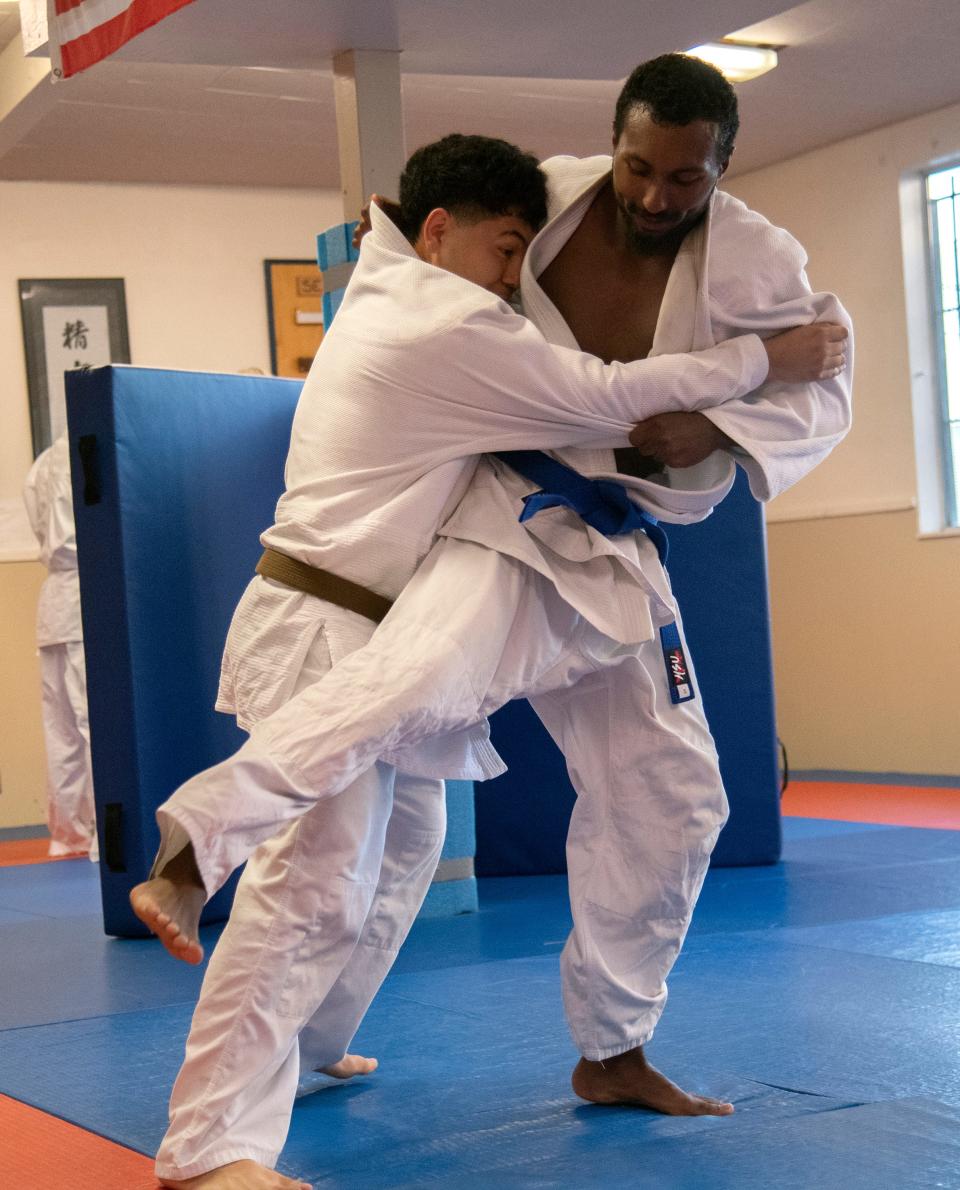 Joaquin Hayes, right, grapples with Joseph Hernandez during a practice of the Stockton Judo Club at the McKinley Park Community Center in south Stockton.