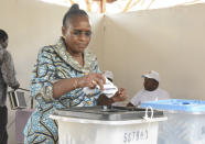 Janeth Magufuli, Tanzania First Lady, casts her vote at Chamwino in Dodoma Tanzania, Wednesday. Oct. 28, 2020. The populist president Magufuli, who made his name in part by targeting corruption, now seeks a second five-year term in one of Africa's most populous and fastest-growing economies. (AP Photo)