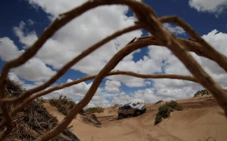 Dakar Rally - 2017 Paraguay-Bolivia-Argentina Dakar rally - 39th Dakar Edition - Fifth stage from Tupiza to Oruro, Bolivia 06/01/17. Mohammed Abu-Issa of Qatar drives his Mini with his copilot Xavier Panseri. REUTERS/Ricardo Moraes