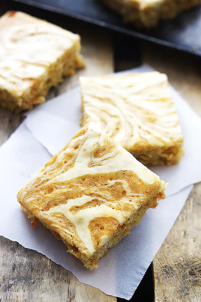 <strong>Get the <a href="http://lecremedelacrumb.com/2015/03/cream-cheese-swirled-carrot-cake-bars.html" target="_blank">Cream Cheese Swirled Carrot Cake Bars recipe</a> from Creme de la Crumb</strong>