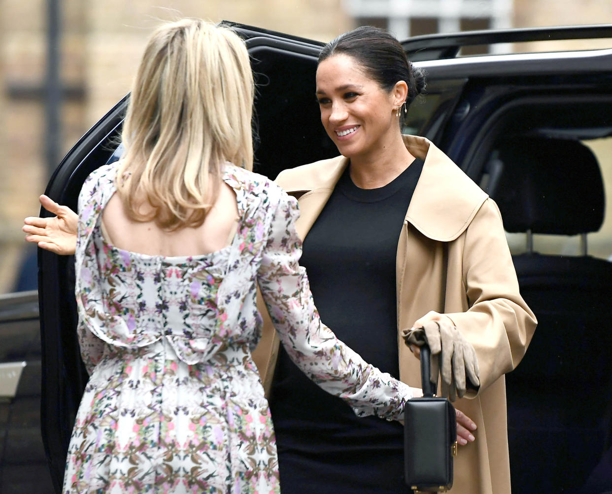 Meghan is welcomed by Kate Stephens, CEO of Smart Works [Photo: PA]