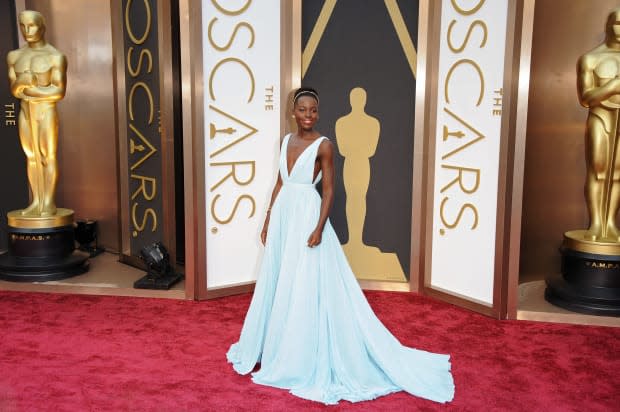 <p>Nyong'o was a modern-day Cinderella in a stunning light blue Prada gown, sparkly earrings and headband. It was surely a fairytale night, as she won Best Supporting Actress for her role in <em>12 Years a Slave</em> at the 86th Annual Academy Awards. </p>