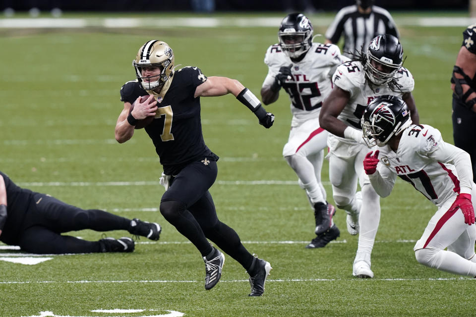 Taysom Hill led the Saints to a win over the Falcons on Sunday. But he still has something to prove as the starting quarterback. (AP Photo/Butch Dill)