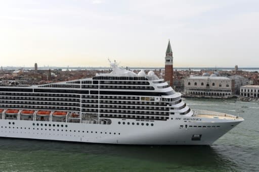 This picture taken on June 9, 2019 shows a MSC Magnifica cruise ship arriving in Venice