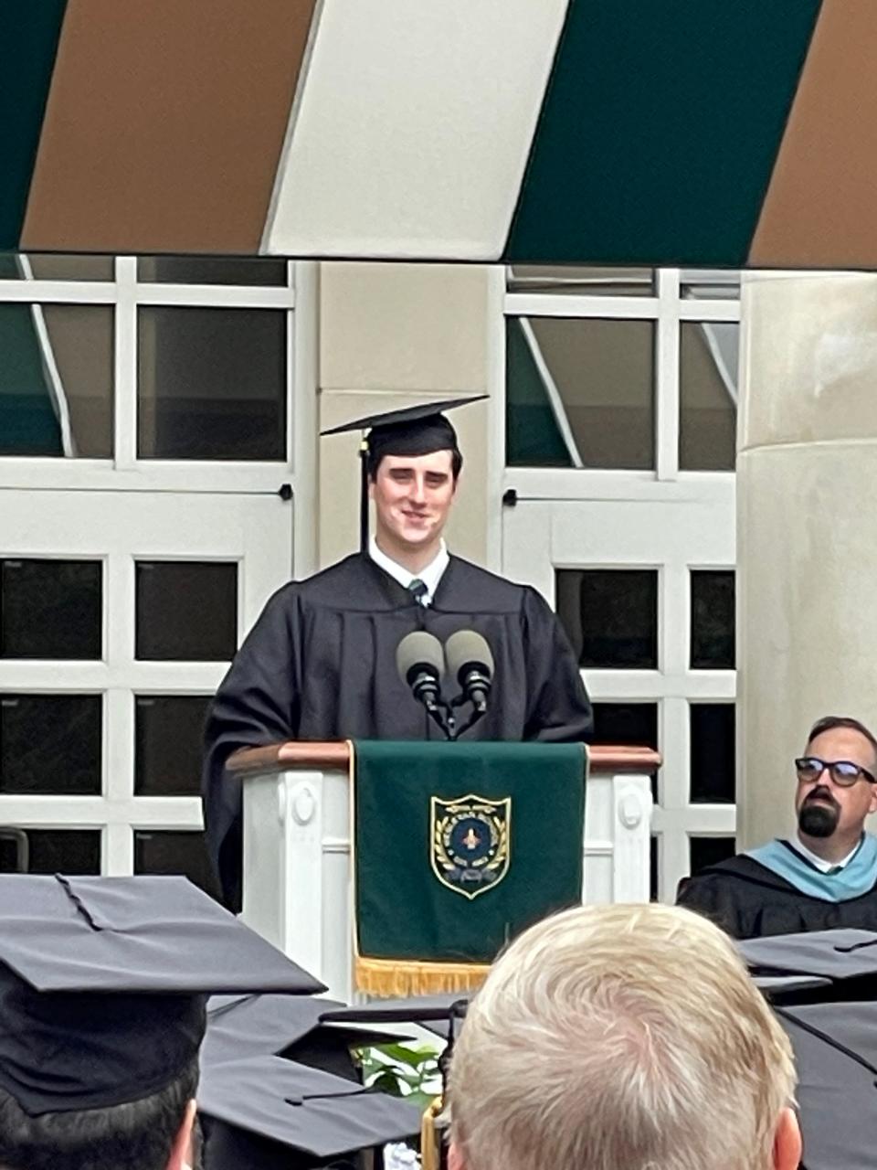 Jackson Murphy delivers the salutatorian address at his high school graduation ceremony.