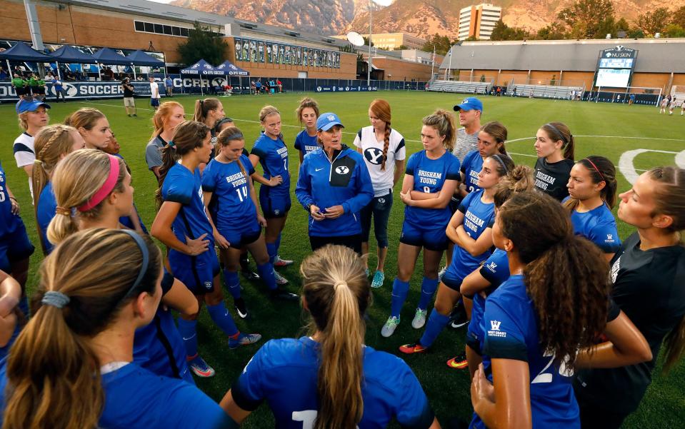 Coach Jennifer Rockwood speaks to her team after game between BYU and Ohio State ended in a scoreless draw at South Field.