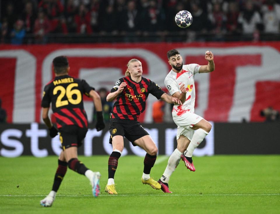 Erling Haaland battles with Leipzig defender Josko Gvardiol (Reuters)