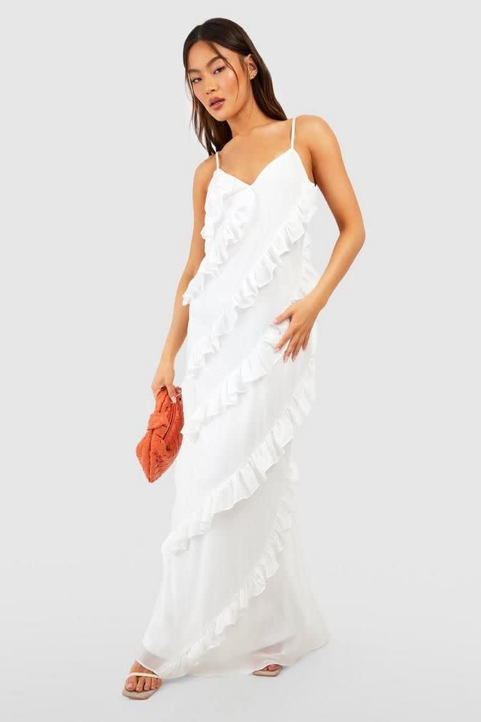 <p><a href="https://go.redirectingat.com?id=74968X1596630&url=https%3A%2F%2Fus.boohoo.com%2Fchiffon-ruffle-detail-maxi-dress%2FGZZ42577-173-24.html&sref=https%3A%2F%2F" rel="nofollow noopener" target="_blank" data-ylk="slk:Shop Now;elm:context_link;itc:0;sec:content-canvas" class="link ">Shop Now</a></p><p>Chiffon Ruffle Detail Maxi Dress</p><p>$27.20</p><p>boohoo.com</p>