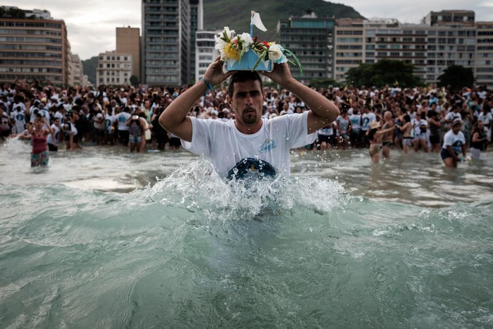 Brazilian worshippers of <a href="http://www.refinery29.com/2015/12/100055/festival-yemanja-new-years-eve-brazil-reveillon#slide">Yemanj&aacute;</a>&nbsp;(also known as Iemanj&aacute;)&nbsp;celebrate the deity by offering flowers and launching boats, large and small, into the ocean during the final days of the year in exchange for blessings in the new year.