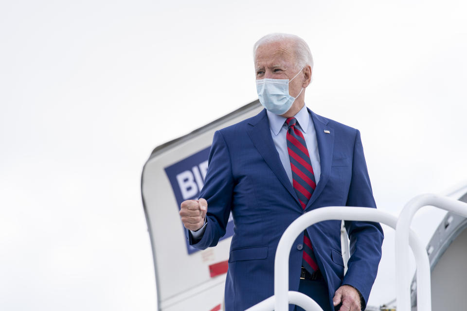 Democratic presidential candidate former Vice President Joe Biden boards his campaign plane at New Castle Airport in New Castle, Del., Monday, Oct. 5, 2020, to travel to Miami for campaign events. (AP Photo/Andrew Harnik)