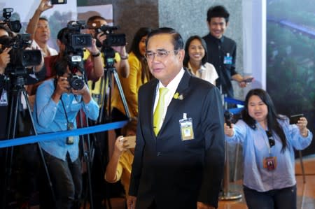 Thailand's Prime Minister Prayuth Chan-ocha arrives before delivering the policy statement of the council of ministers, at the parliament in Bangkok