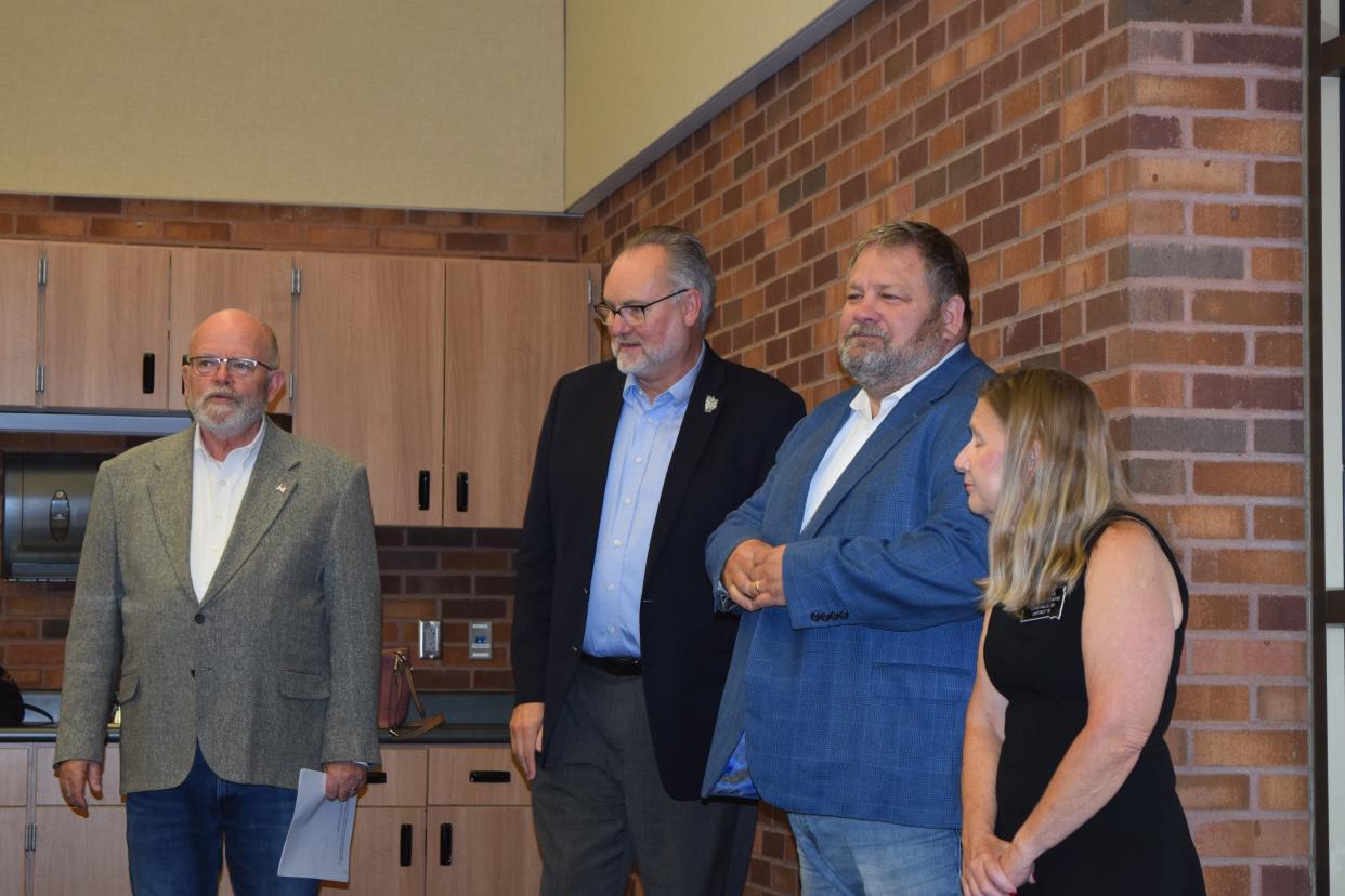 Jeff Barth (left), Minnehaha County commissioner, alongside Democrats Reynold Nesiba, Jamie Smith and Linda Duba, at a Sioux Falls library press conference on Thursday, July 28, 2022.