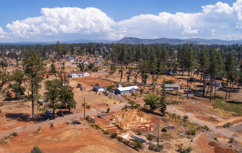 The Camp Fire destroyed Paradise, CA, in 2018. Residents are rebuilding but still grappling with the trauma of losing homes and loved ones. A few new homes have been built on Fairview Drive.