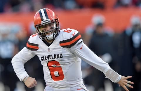 Cleveland Browns quarterback Baker Mayfield celebrates after running back Nick Chubb rushed for a 4-yard touchdown during the second half of an NFL football game against the Carolina Panthers - Credit: AP Photo/David Richard