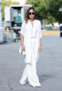 <p>The Song of Style fashion blogger got white on white so right on the streets of New York City. She also made the case for this season’s favorite pant silhouette: the wide-leg.</p>