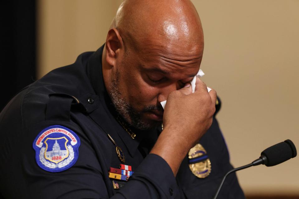 U.S. Capitol Police Officer Harry Dunn becomes emotional as he testifies before the House Select Committee investigating the January 6, 2021, attack on the U.S. Capitol.