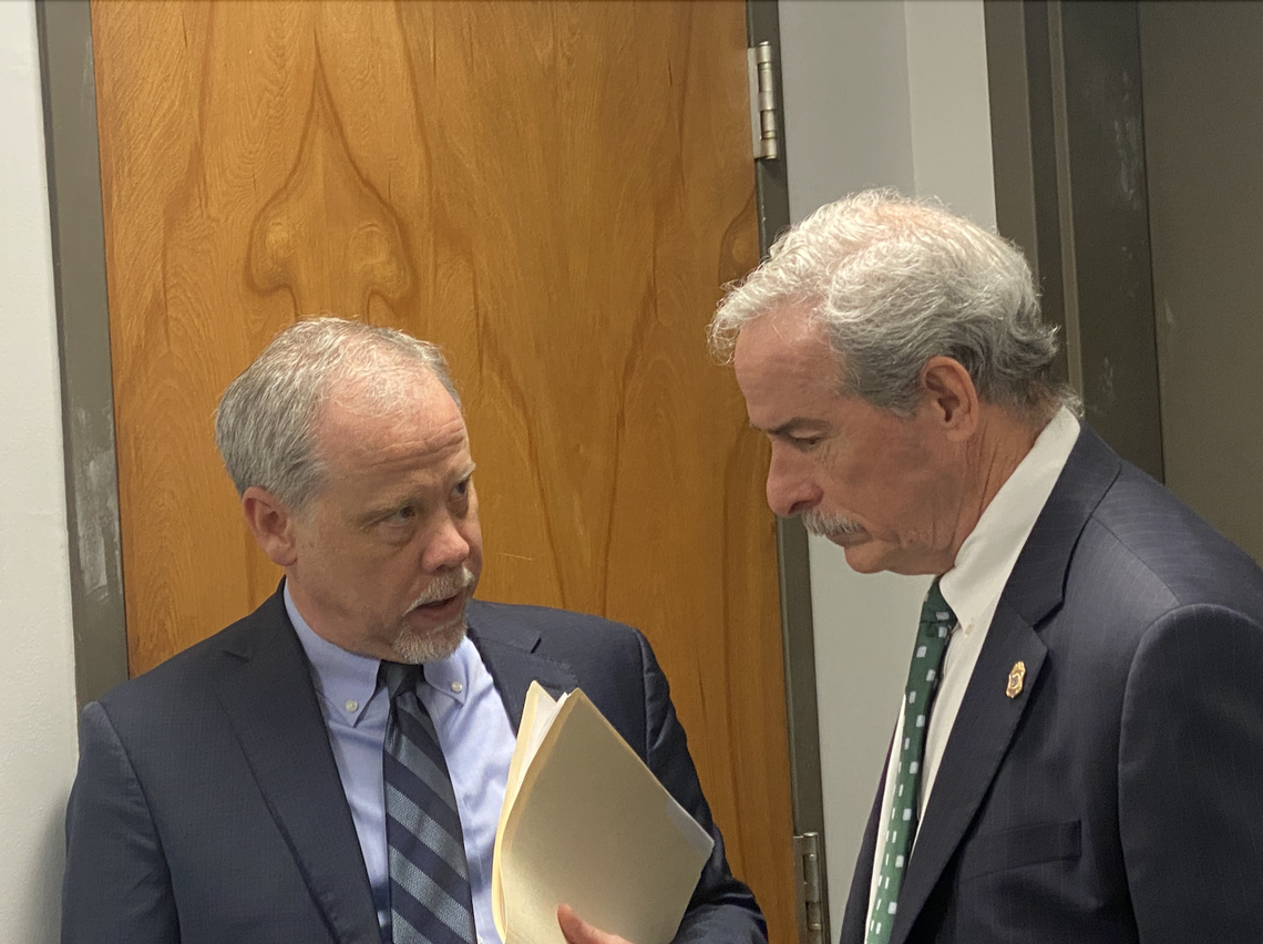 Creighton Waters, an attorney with the S.C. Attorney General’s office, speaks with State Law Enforcement Division Chief Mark Keel on Jan. 12, 2023.