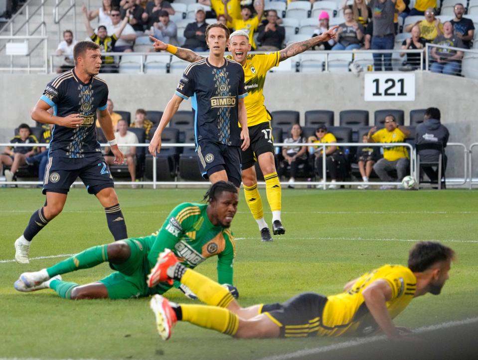 August 21, 2024; Columbus, Ohio, USA; 
Columbus Crew forward Christian Ramirez (17) celebrates as he sees a shot by Columbus Crew forward Diego Rossi (10) get in the goal during a semifinal Leagues Cup match against the Philadelphia Union at Lower.com Field.