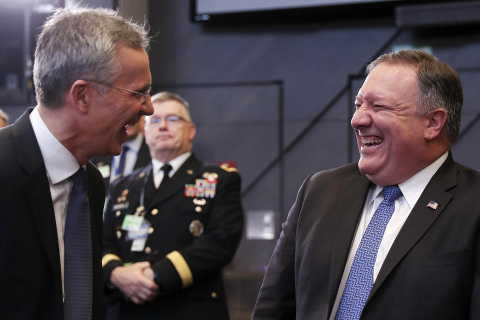 NATO Secretary General Jens Stoltenberg, left, speaks with U.S. Secretary of State Mike Pompeo during a meeting of the North Atlantic Council at NATO headquarters in Brussels, Tuesday, Dec. 4, 2018. Russia takes center-stage at NATO Tuesday, as allied foreign ministers meet to debate ways to dissuade Moscow from destabilizing Ukraine and respect a landmark Cold-war era nuclear treaty. (AP Photo/Francisco Seco)