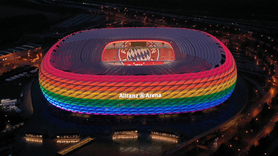 Pictured here, Munich's Allianz Arena glows in rainbow coloured lighting.