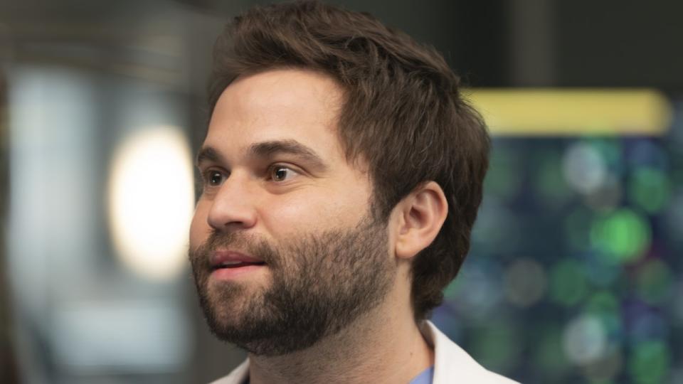 A close-up of Levi Schmitt on Grey's Anatomy, played by Jake Borelli.