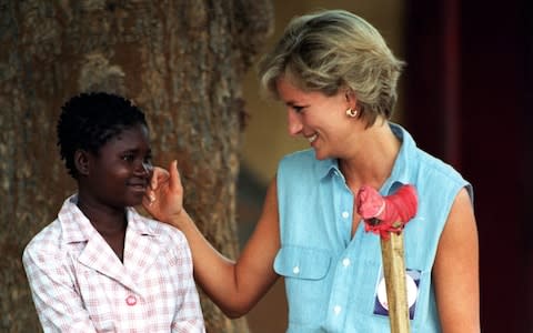 Diana, Princess of Wales, meets landmine victim Sandra Thijik in 1997 - Credit: Getty