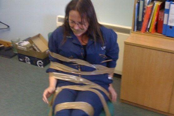 DeeAnn Fitzpatrick, 49, claims male colleagues taped her to a chair and gagged her: BBC