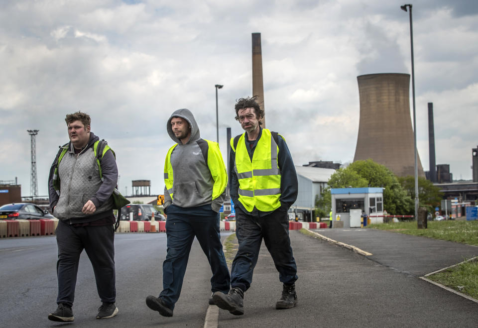 Workers leave the steelworks plant in Scunthorpe following a shift change as owner British Steel is to go into official recievership after failing to secure funds for its future.