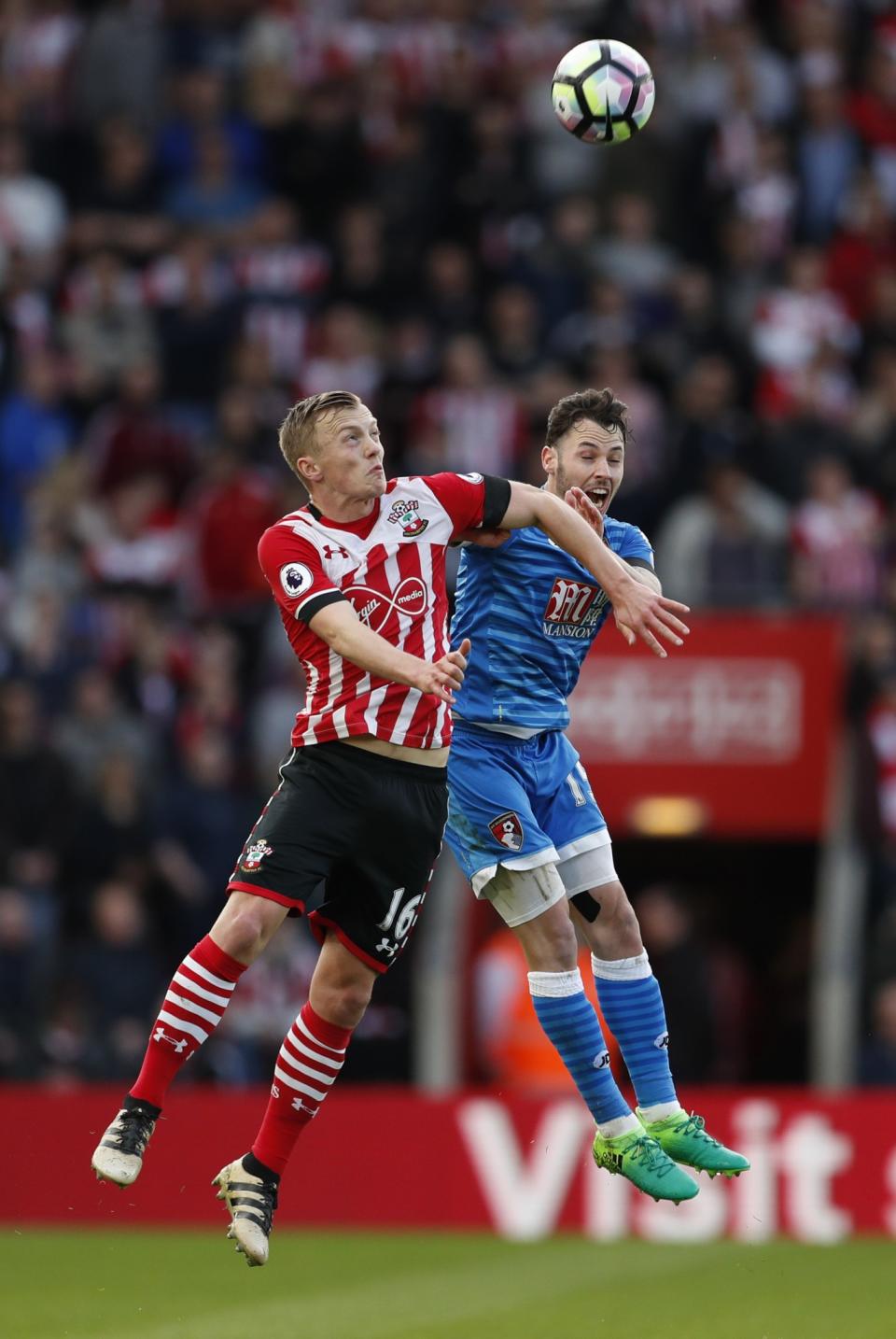 <p>Southampton’s James Ward-Prowse in action with Bournemouth’s Adam Smith </p>