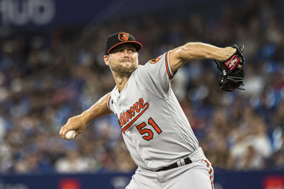 Baltimore Orioles starting pitcher Austin Voth (51) throws during the first inning of a baseball game against the Toronto Blue Jays in Toronto on Wednesday, Aug. 17, 2022. (Christopher Katsarov/The Canadian Press via AP)