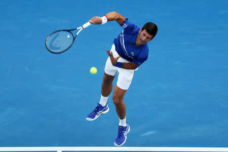 Tennis - Australian Open - First Round - Melbourne Park, Melbourne, Australia, January 15, 2019. Serbia’s Novak Djokovic in action during the match against Mitchell Krueger of the U.S. REUTERS/Lucy Nicholson