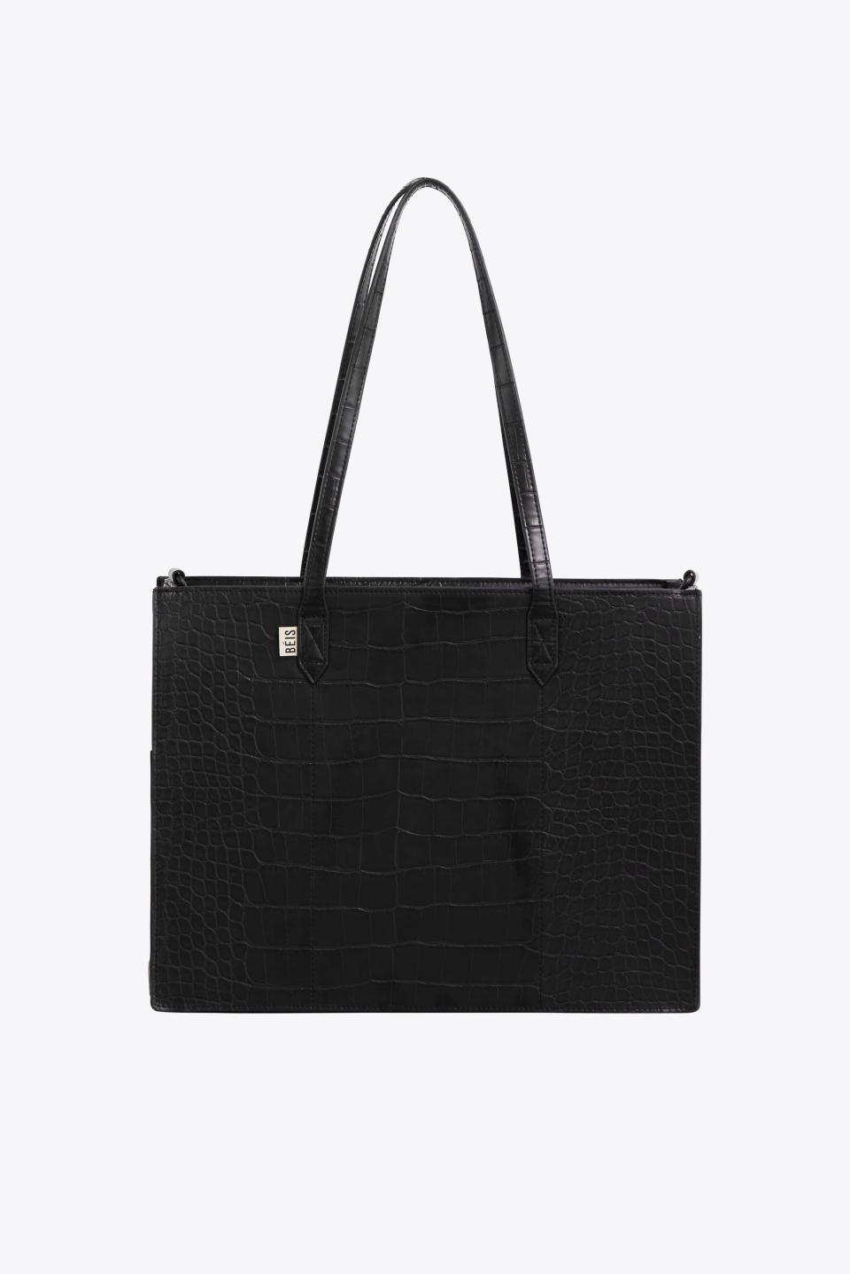 <p><a href="https://go.redirectingat.com?id=74968X1596630&url=https%3A%2F%2Fbeistravel.com%2Fproducts%2Fthe-work-tote-in-black-croc&sref=https%3A%2F%2F" rel="nofollow noopener" target="_blank" data-ylk="slk:Shop Now;elm:context_link;itc:0;sec:content-canvas" class="link ">Shop Now</a></p><p>The Work Tote </p><p>beistravel.com</p><p>$96.00</p><span class="copyright">Beis</span>