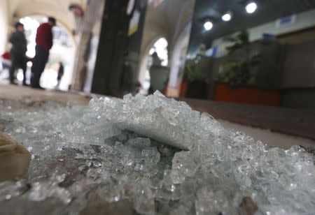 Debris from a damaged shop is seen after a blast in central Cairo February 3, 2015. REUTERS/Mohamed Abd El Ghany