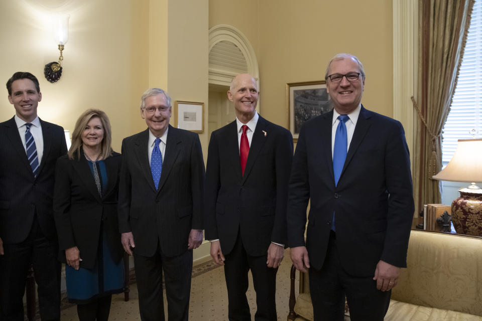 Incoming GOP senators for the 116th Congress, from left, Sen.-elect Josh Hawley, R-Mo., Sen.-elect Marsha Blackburn, R-Tenn., Majority Leader Mitch McConnell, R-Ky., Florida Gov. Rick Scott, the Republican candidate in the undecided race for Senate from Florida, and Sen.-elect Kevin Cramer, R-N.D., meet at the Capitol in Washington, Wednesday, Nov. 14, 2018. (AP Photo/J. Scott Applewhite)