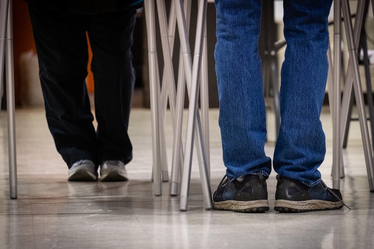 Voters cast their ballots at First United Methodist Church Tuesday, Nov. 3, 2020, which serves as the polling location for precincts 6 and 7.