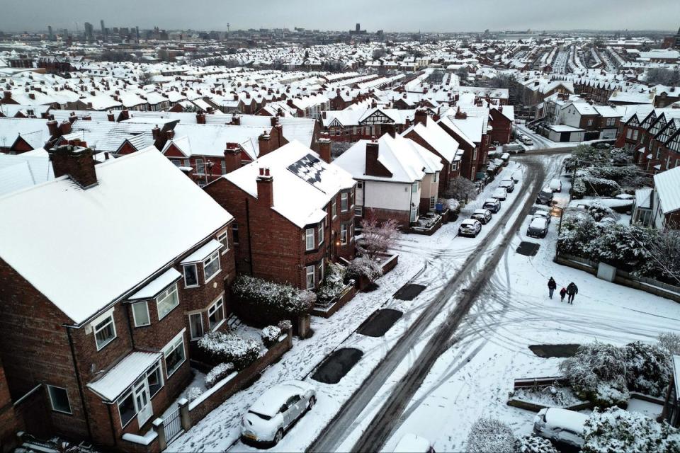 Snow covered houses in Birkenhead, northwest England (AFP via Getty Images)