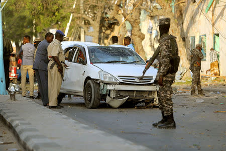 Somali security forces secure the scene of an explosion outside Weheliye Hotel in Maka al Mukarama street in Mogadishu, Somalia March 22, 2018 REUTERS/Feisal Omar