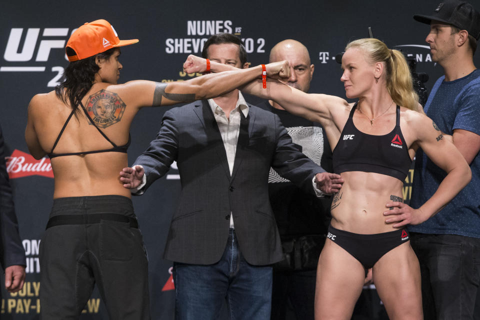 Amanda Nunes, left, and Valentina Shevchenko pose during the UFC 213 ceremonial weigh-in. (AP)