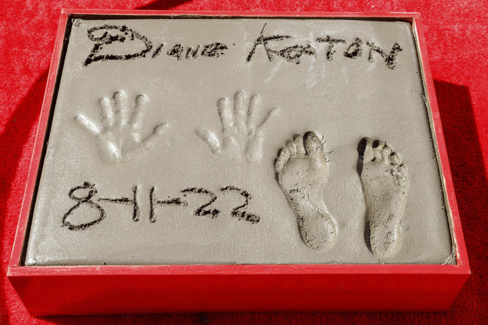 A cement slab showing the hand and footprints of actress Diane Keaton (Willy Sanjuan/Invision/AP)