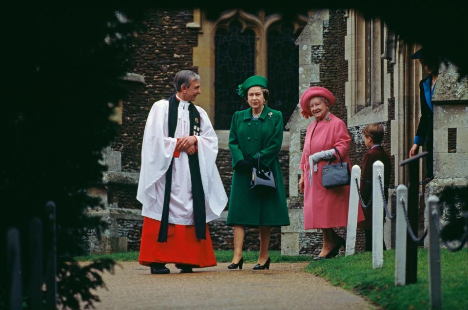 Queen Elizabeth II, the Queen Mother, and Prince William walking with the vicar of St. Mary Magdalene Church near Sandringham House on Christmas Day, 1988.