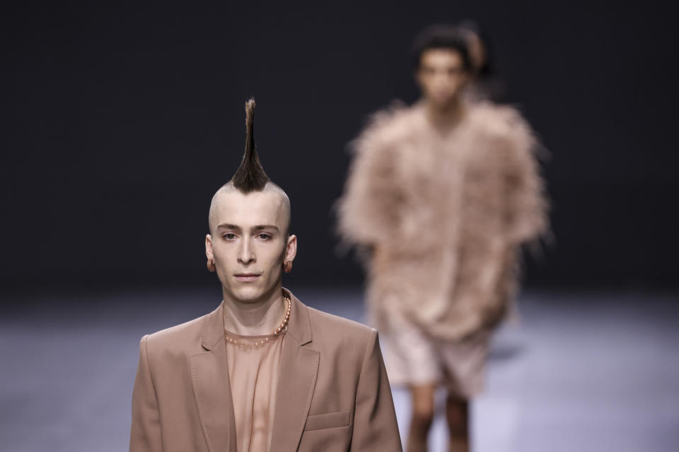 A model wears a creation for the Valentino ready-to-wear Spring/Summer 2023 fashion collection presented Sunday, Oct. 2, 2022 in Paris. (Photo by Vianney Le Caer/Invision/AP)