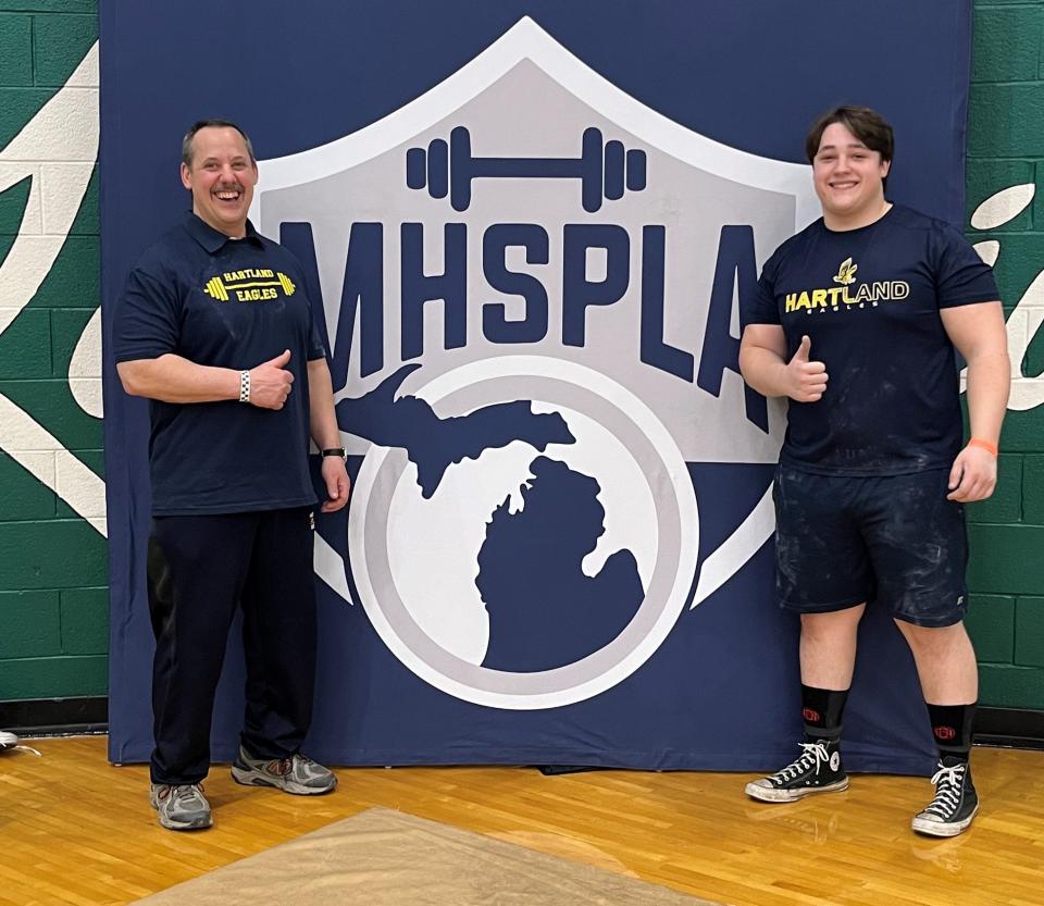 Hartland junior Roman Ignagni (right), pictured with his father, Dan, had the heaviest total in any division at the state powerlifting championships.