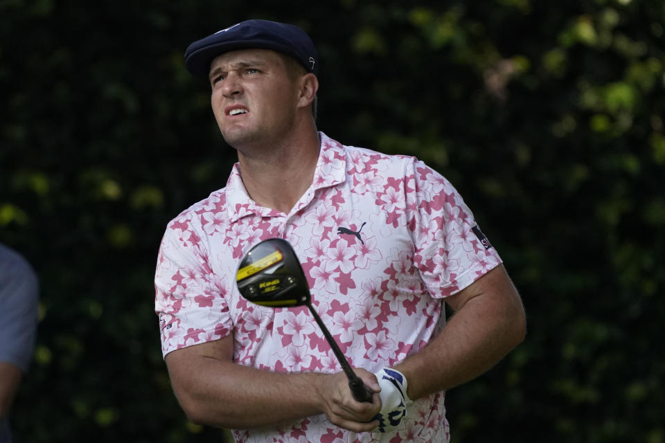 Bryson DeChambeau watches his tee shot on the second hole during the third round of the Masters golf tournament Saturday, Nov. 14, 2020, in Augusta, Ga. (AP Photo/Charlie Riedel)