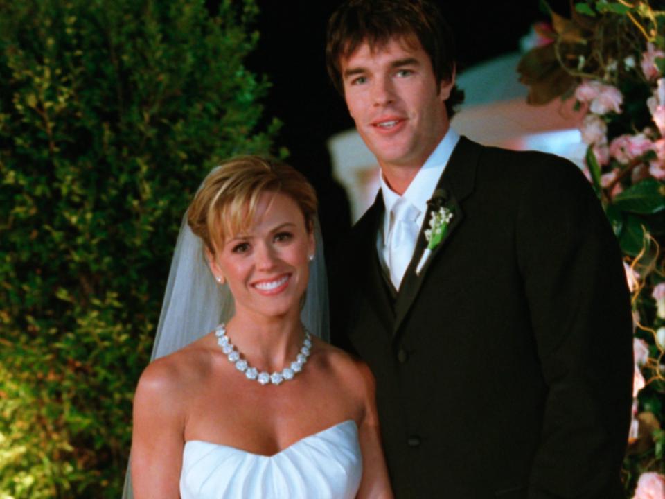 Trista Rehn, in a white strapless dress, and Ryan Sutter, in a black suit, on their wedding day in 2003.