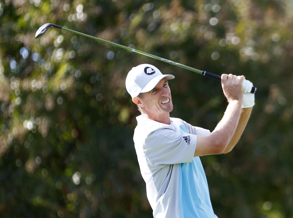 Steven Alker looks on his tee shot at the 10th hole during the second day of the Dominion Energy Charity Classic golf tournament at Country Club of Virginia on Saturday, Oct. 23, 2021, in Richmond, Va. (Daniel Sangjib Min/Richmond Times-Dispatch via AP)